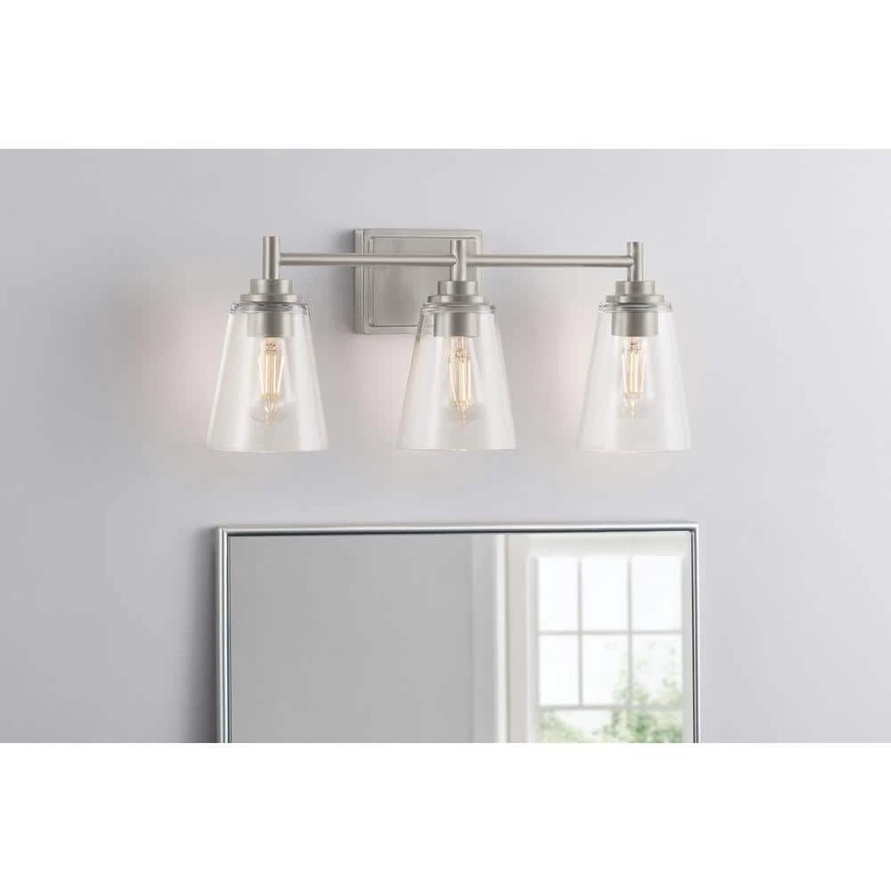 Wakefield 22 in. 3-Light Brushed Nickel Modern Wall Mount Sconce Light with Clear Glass Shades by Hampton Bay 3 Wakefield 22 in. 3-Light Brushed Nickel Modern Wall Mount Sconce Light with Clear Glass Shades by Hampton Bay - Image 3