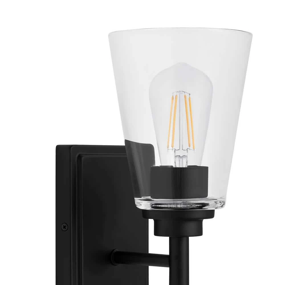 Wakefield 5.25 in. 1-Light Matte Black Modern Wall Mount Sconce Light with Clear Glass Shade by Hampton Bay 4 Wakefield 5.25 in. 1-Light Matte Black Modern Wall Mount Sconce Light with Clear Glass Shade by Hampton Bay - Image 4