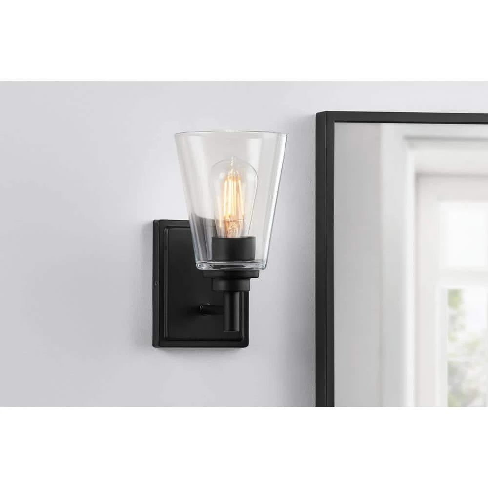 Wakefield 5.25 in. 1-Light Matte Black Modern Wall Mount Sconce Light with Clear Glass Shade by Hampton Bay 2 Wakefield 5.25 in. 1-Light Matte Black Modern Wall Mount Sconce Light with Clear Glass Shade by Hampton Bay - Image 2