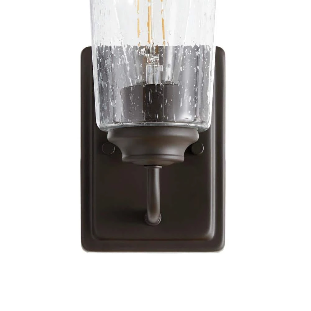 Evangeline 4.5 in. 1-Light Modern Bronze Indoor Wall Farmhouse Sconce with Clear Seeded Glass Shade by Hampton Bay 4 Evangeline 4.5 in. 1-Light Modern Bronze Indoor Wall Farmhouse Sconce with Clear Seeded Glass Shade by Hampton Bay - Image 4