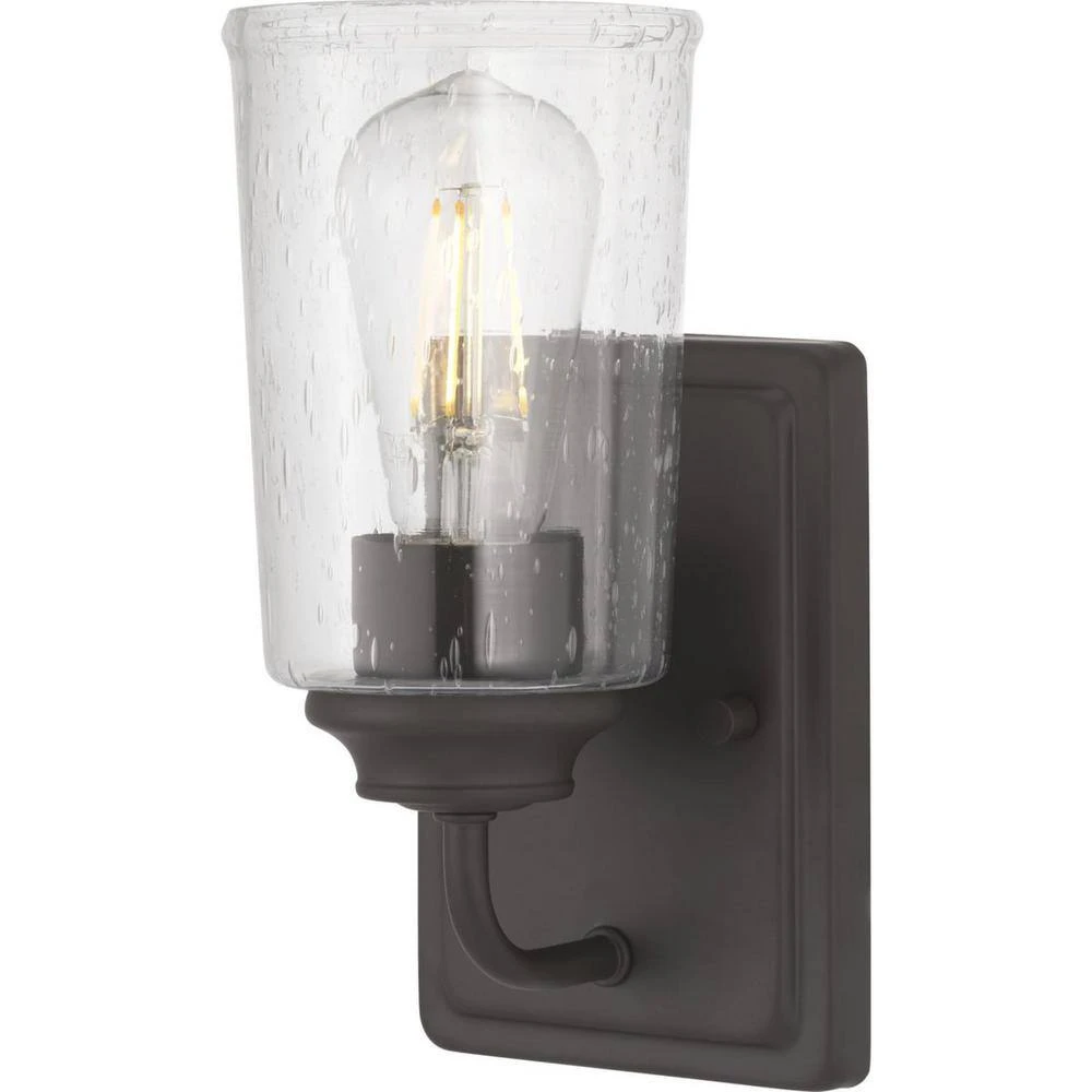 Evangeline 4.5 in. 1-Light Modern Bronze Indoor Wall Farmhouse Sconce with Clear Seeded Glass Shade by Hampton Bay 8 Evangeline 4.5 in. 1-Light Modern Bronze Indoor Wall Farmhouse Sconce with Clear Seeded Glass Shade by Hampton Bay - Image 8
